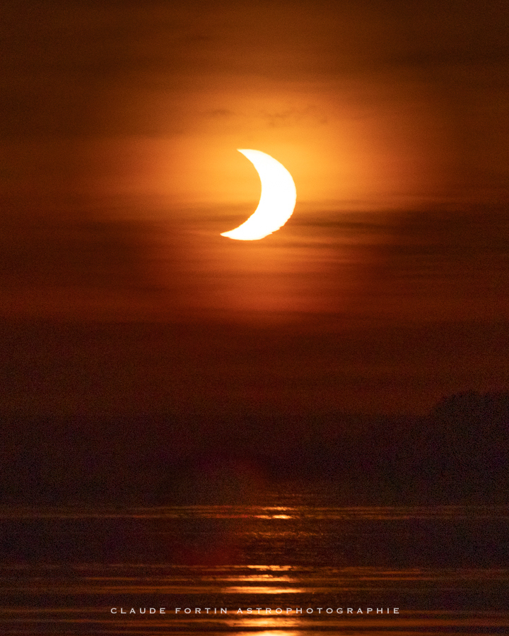 Eclipse partielle de soleil quai de Ste Anne de Beaupre